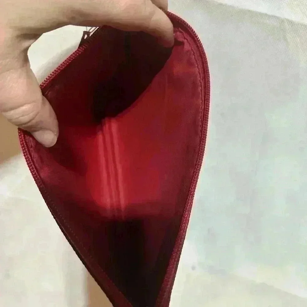 Coach story pouch